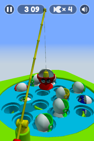 テーブルフィッシングのゲーム画面「上手く口の中に磁石を入れると魚が釣れます。」