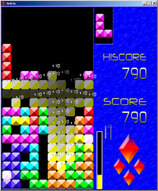 tetrisのゲーム画面「光るブロックを消して、周りのブロックを巻き込んでいるところです」
