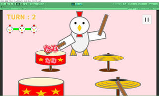 リズム動物園のゲーム画面「ニワトリがドラムやシンバルを叩くので、同じタイミングで自分も叩きます」