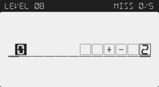 NUMBLTのゲーム画面「右方向に流れる黒ブロックを操作」